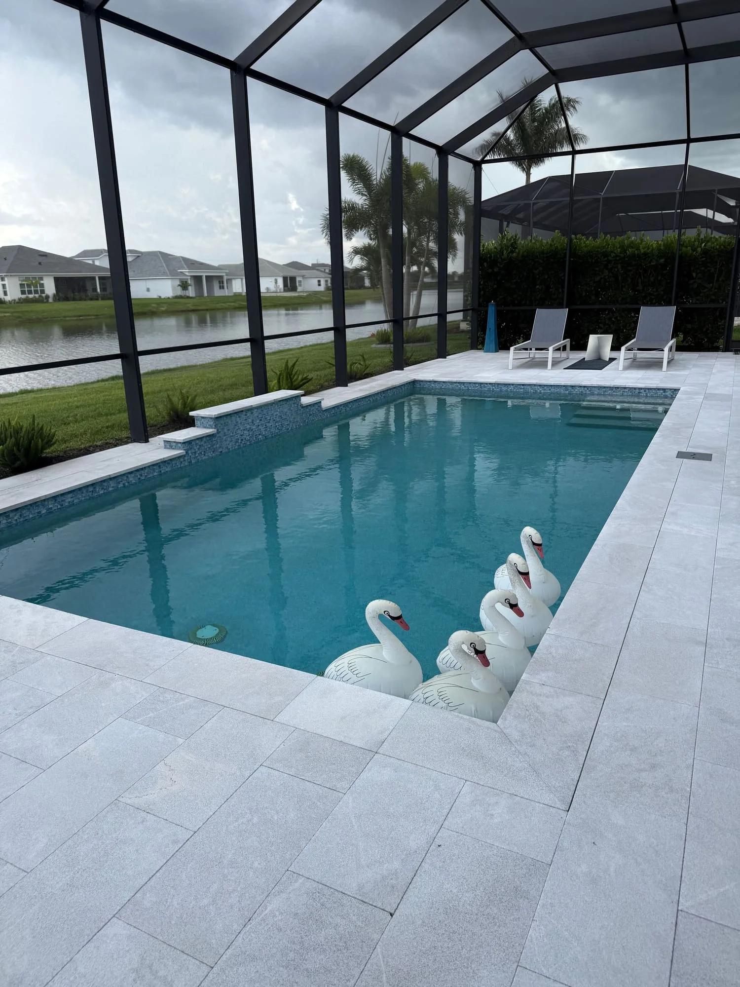 Marble pool deck installed by Paving Crew